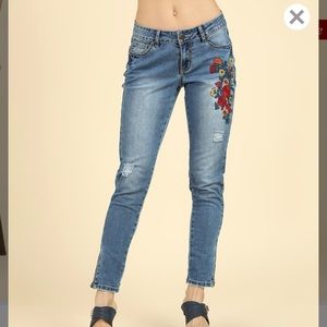 Suzanne Betro embroidered straight leg jeans.